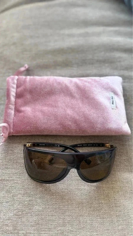 Miu Miu oversized statement sunglasses